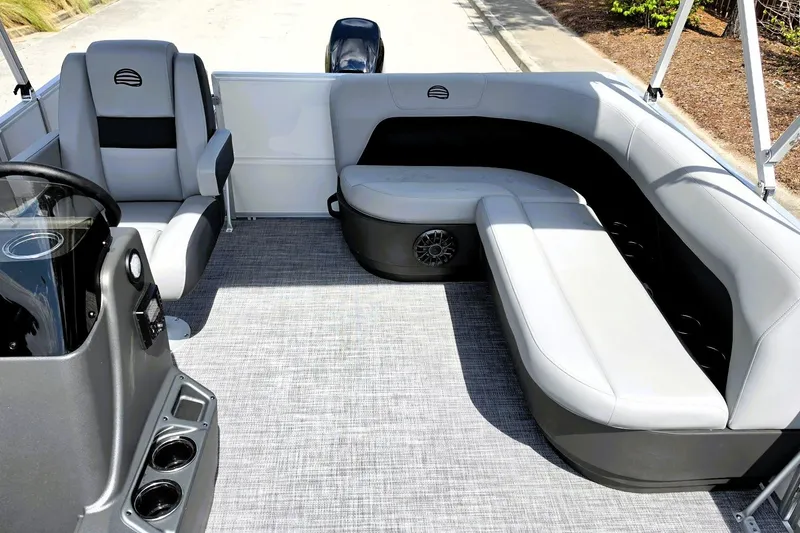 Slide: The Image of 2027 Sun Tracker Party Barge 16 DLX interior with gray seating and modern design. - 13