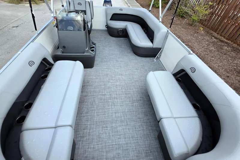 Slide: The Image of 2027 Sun Tracker Party Barge 16 DLX interior with spacious seating and modern design. - 14