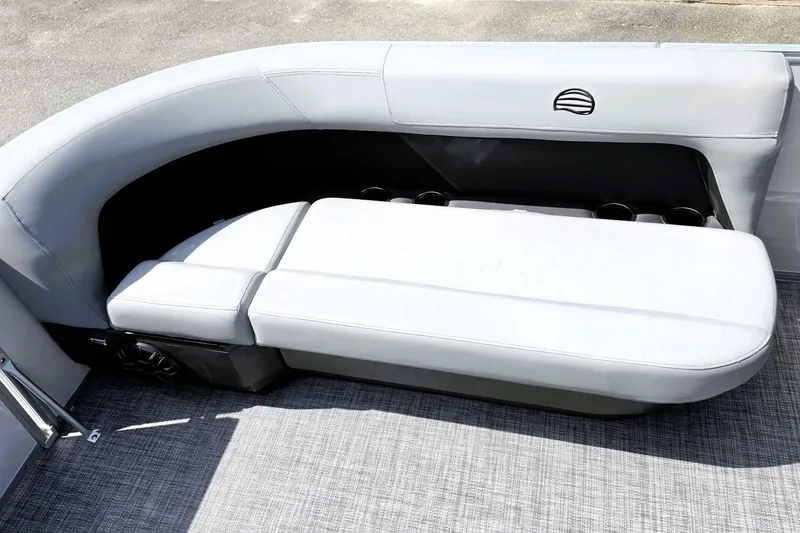 Slide: The Image of 2027 Sun Tracker Party Barge 16 DLX pontoon boat seating with cup holders. - 17