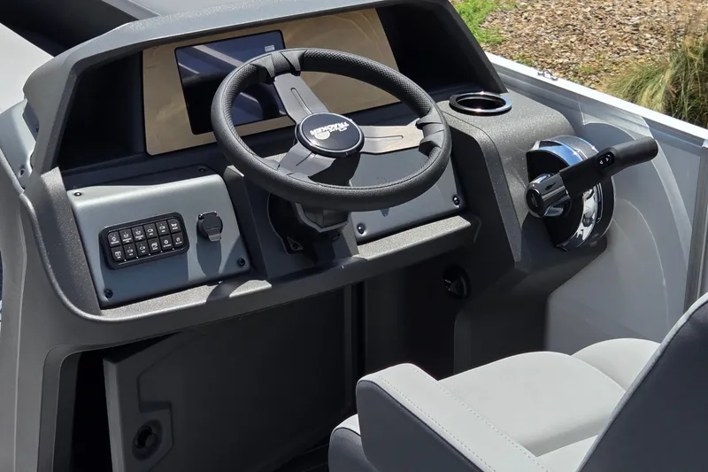 Slide: The Image of Steering console of 2027 Sun Tracker Party Barge 18 DLX pontoon boat. - 14