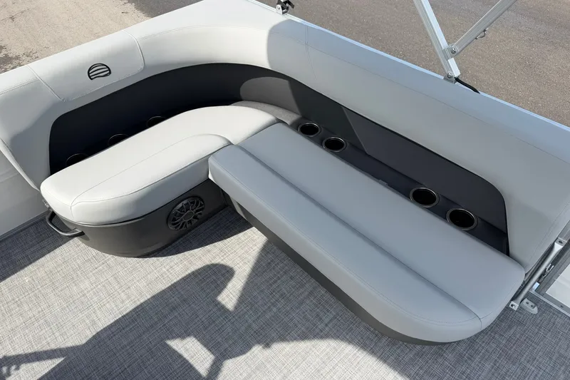 Slide: The Image of Luxurious seating on 2027 Sun Tracker Party Barge 16 DLX with cup holders. - 18