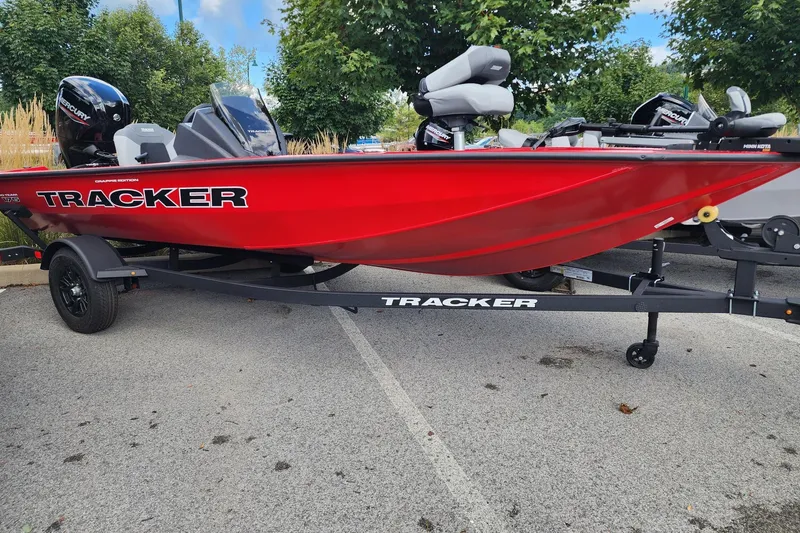 The Image of 2027 Tracker Pro Team 175 Crappie Edition boat in vibrant red on trailer. - 0
