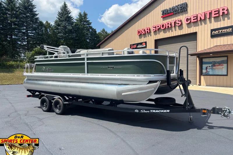 The Image of 2027 Sun Tracker Fishin' Barge 20 DLX pontoon boat on trailer at D&R Sports Center. - 0