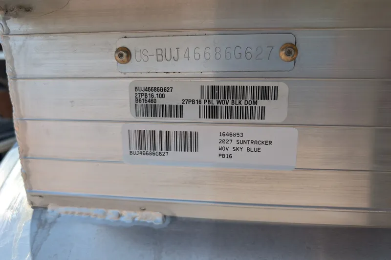 Slide: The Image of 2027 Sun Tracker Party Barge 16 DLX identification labels and serial numbers. - 15
