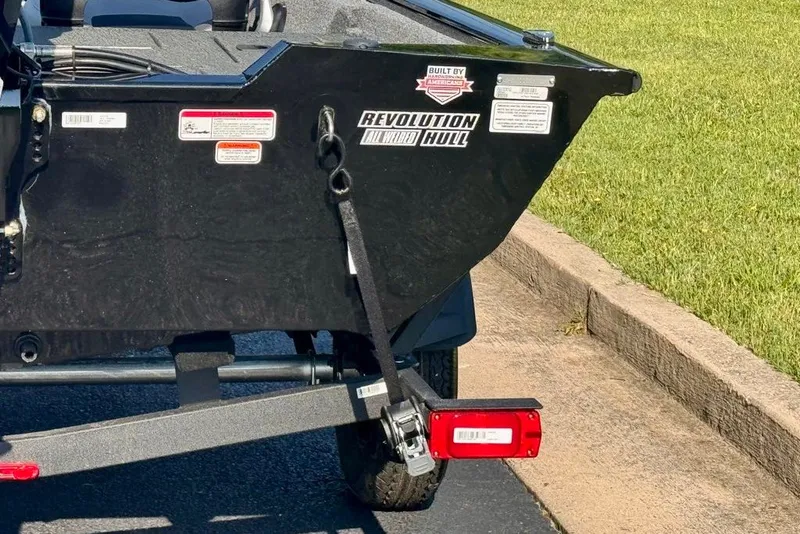 Slide: The Image of 2027 Tracker Pro Team 175 Crappie Edition boat on trailer, featuring Revolution Hull design. - 16