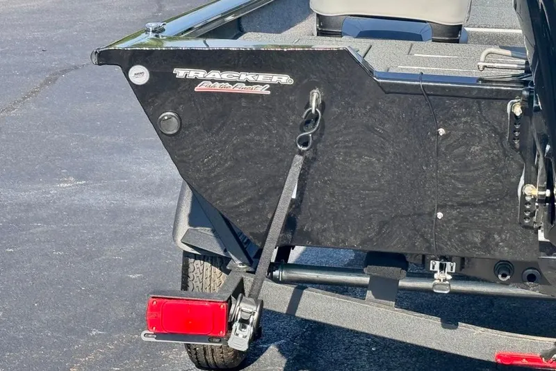 Slide: The Image of 2027 Tracker Pro Team 175 Crappie Edition boat rear view on trailer. - 17