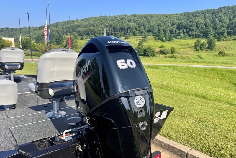 Slide: The Image of 2027 Tracker Pro Team 175 Crappie Edition boat with Mercury 60 engine in scenic setting. - 15