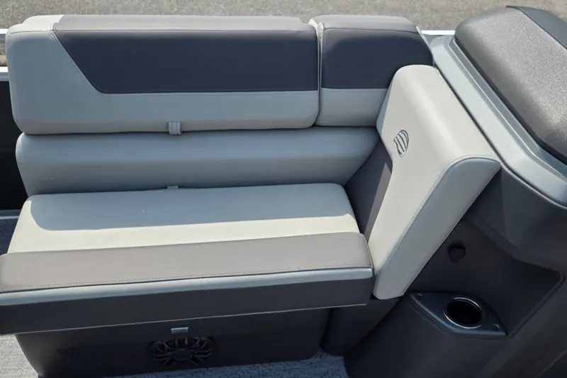Slide: The Image of 2027 Sun Tracker Fishin' Barge 20 DLX boat seating with cup holder and speaker. - 30