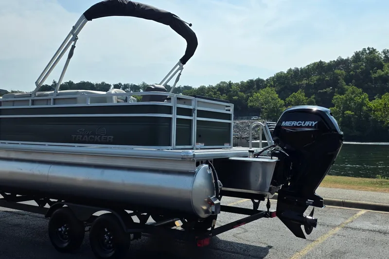 Slide: The Image of 2027 Sun Tracker Fishin' Barge 20 DLX pontoon boat with Mercury outboard motor. - 17