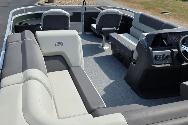 Slide: The Image of Interior of 2027 Sun Tracker Fishin' Barge 20 DLX pontoon boat with seating and console. - 27