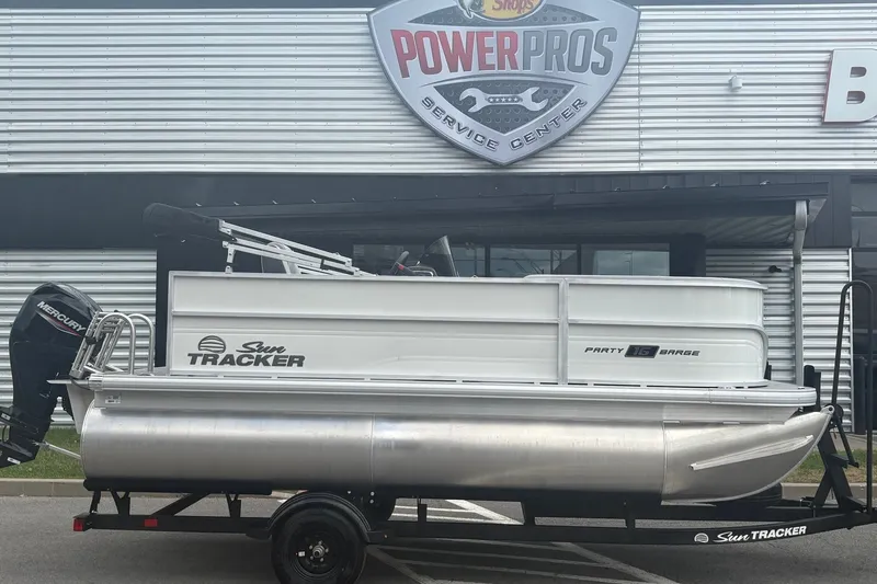 The Image of 2027 Sun Tracker Party Barge 16 DLX pontoon boat at Power Pros Service Center. - 0