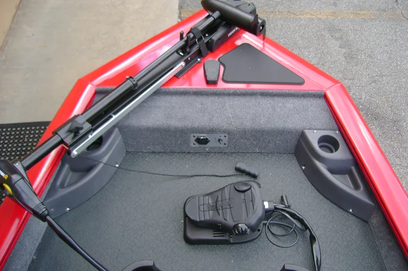 Slide: The Image of 2027 Tracker Pro Team 175 Crappie Edition boat interior with trolling motor and foot pedal. - 13