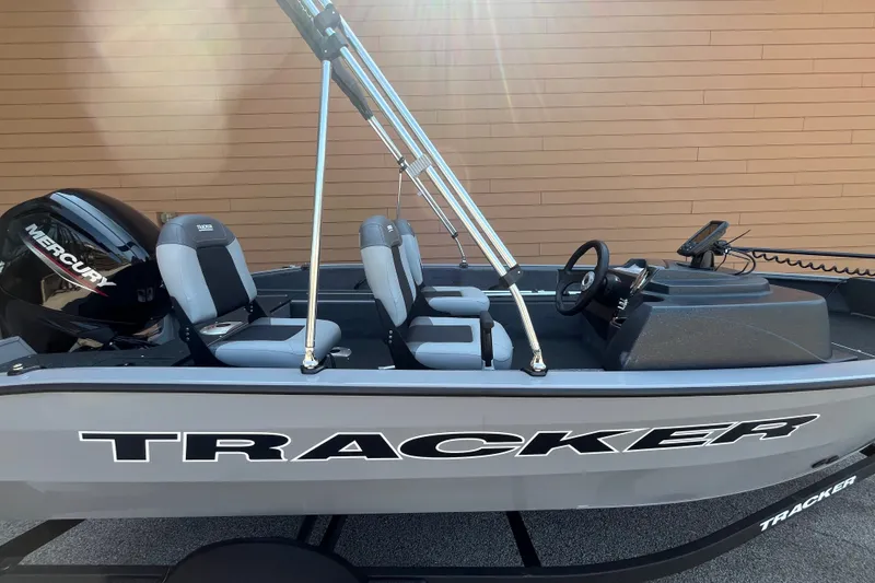 The Image of 2027 Tracker Pro Guide V-16 SC boat with Mercury engine, side view. - 0