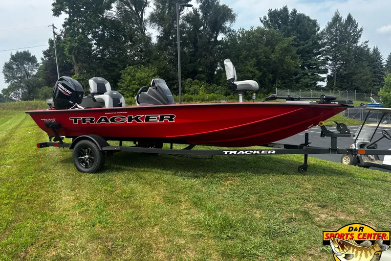 The Image of 2027 Tracker Pro Team 175 Crappie Edition boat on trailer, red color, outdoor setting. - 0