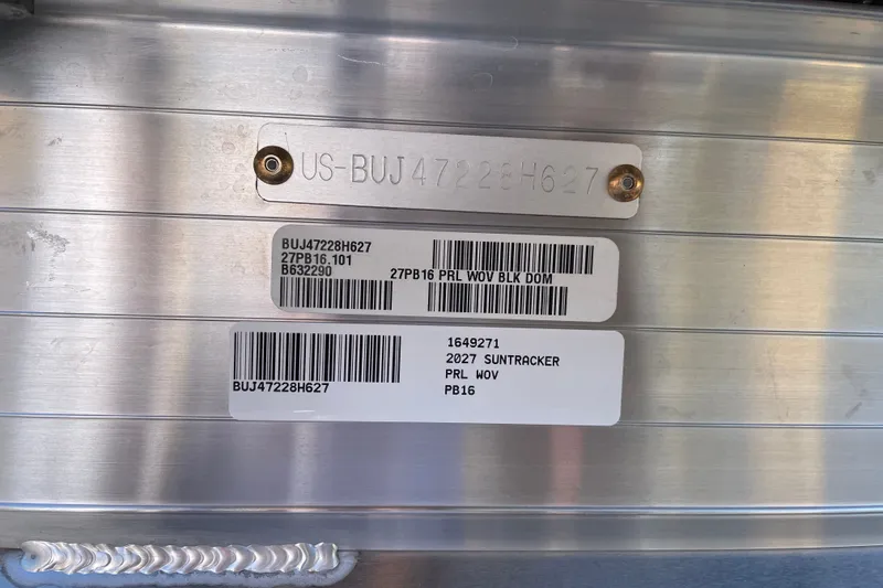 Slide: The Image of 2027 Sun Tracker Party Barge 16 DLX identification plate with serial numbers and barcodes. - 81