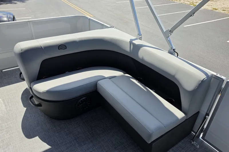 Slide: The Image of 2027 Sun Tracker Party Barge 18 DLX with gray seating on deck. - 13