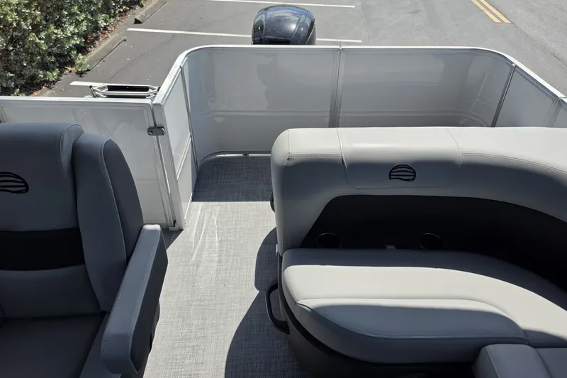 Slide: The Image of Interior of 2027 Sun Tracker Party Barge 18 DLX pontoon boat with gray seating. - 14