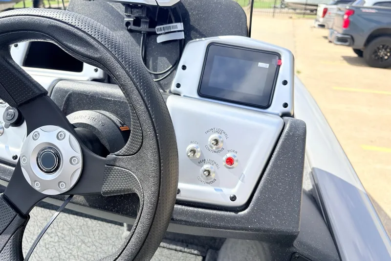 Slide: The Image of Steering wheel and dashboard of 2027 Tracker Pro Team 175 Crappie Edition boat. - 26