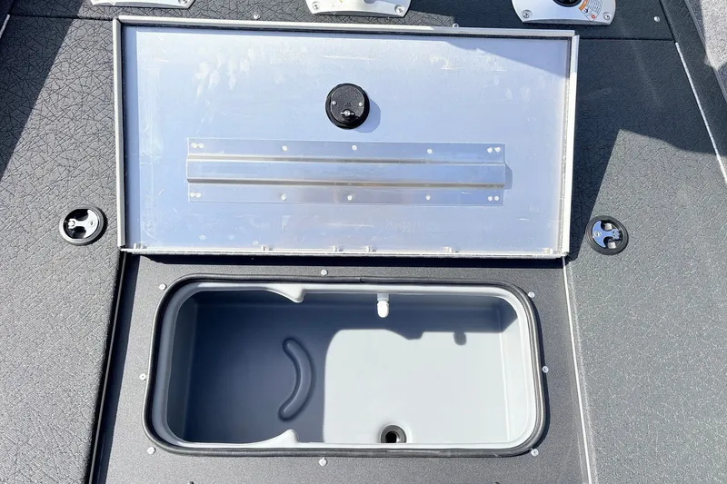 Slide: The Image of Open storage compartment on 2027 Tracker Pro Team 175 Crappie Edition boat. - 19