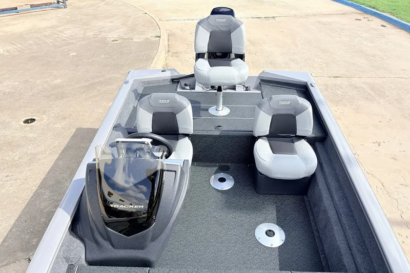 Slide: The Image of 2027 Tracker Pro Team 175 Crappie Edition boat interior with seating and console. - 20