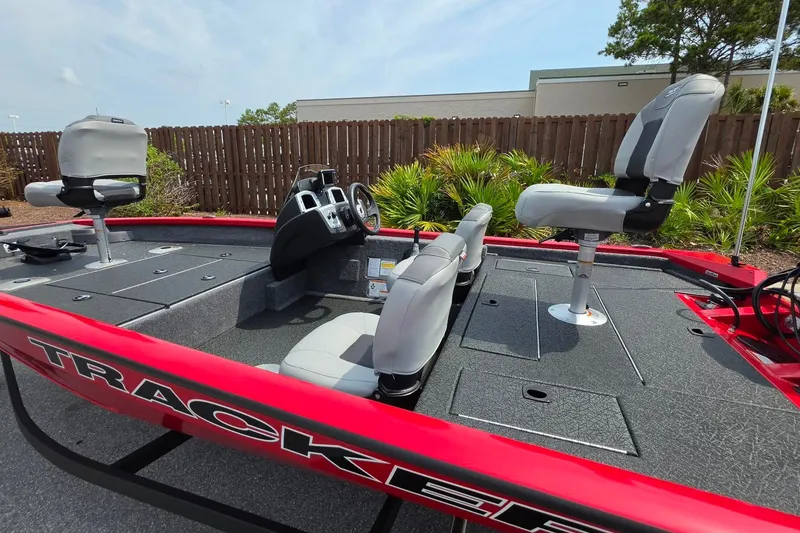 Slide: The Image of 2027 Tracker Pro Team 175 Crappie Edition boat with seating and steering console. - 16