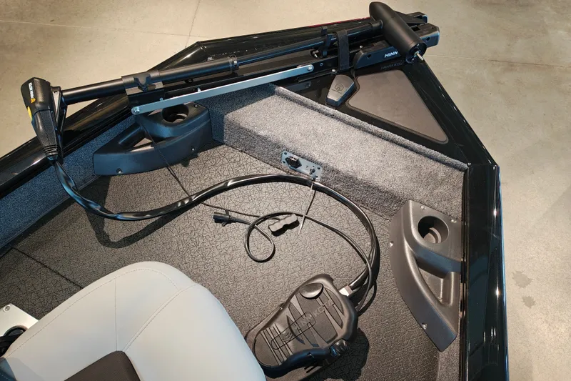 Slide: The Image of 2027 Tracker Pro Team 175 Crappie Edition boat interior with trolling motor and foot pedal. - 22
