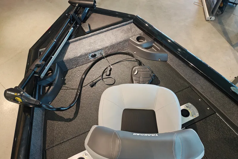 Slide: The Image of 2027 Tracker Pro Team 175 Crappie Edition boat interior with trolling motor and seat. - 21