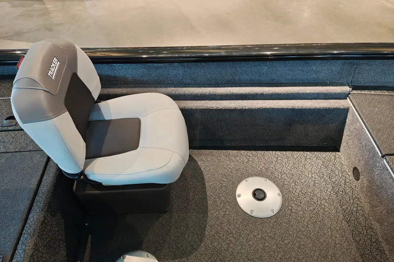 Slide: The Image of 2027 Tracker Pro Team 175 Crappie Edition boat seat, gray upholstery, interior view. - 16