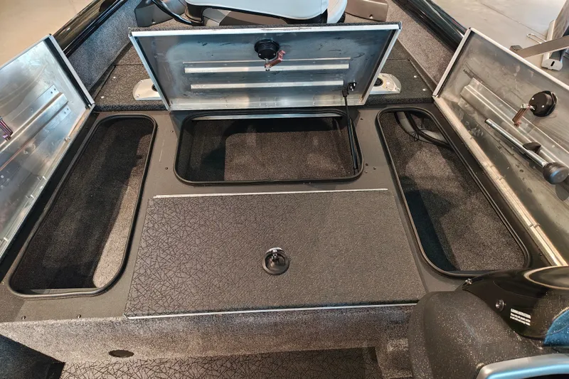 Slide: The Image of 2027 Tracker Pro Team 175 Crappie Edition boat interior with open storage compartments. - 19