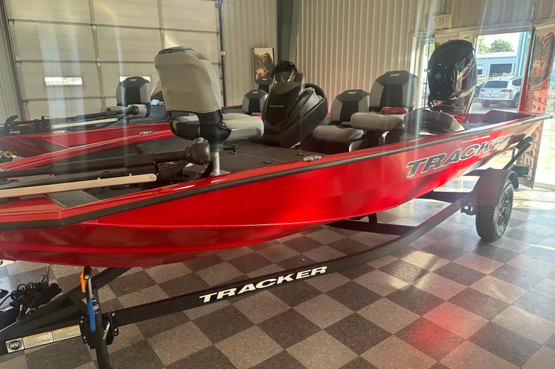 The Image of 2027 Tracker Pro Team 175 Crappie Edition boat in showroom, vibrant red color. - 0