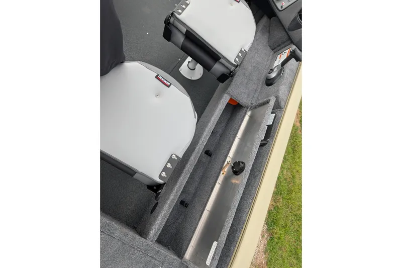 Slide: The Image of 2027 Tracker Pro Guide V-16 SC boat interior with seating and storage compartments. - 52