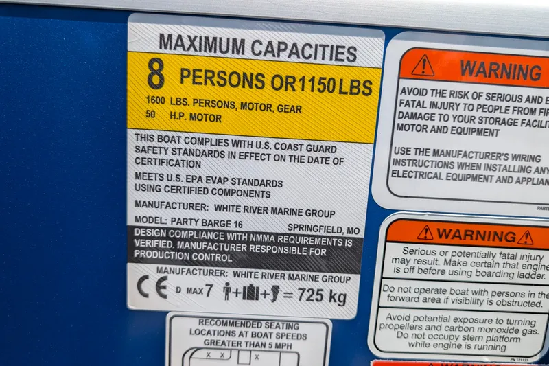 Slide: The Image of 2027 Sun Tracker Party Barge 16 DLX capacity label, 8 persons or 1150 lbs, safety warnings. - 13