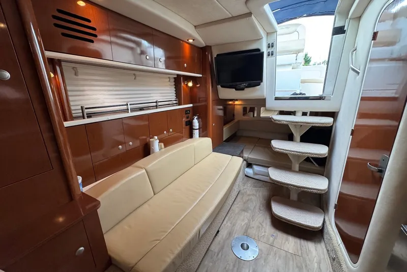Slide: The Image of Luxurious interior of 2008 Sea Ray Sundancer 310 yacht with elegant seating and modern amenities. - 20