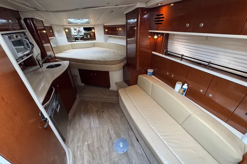 Slide: The Image of Luxurious interior of a 2008 Sea Ray Sundancer 310 yacht with modern amenities. - 19