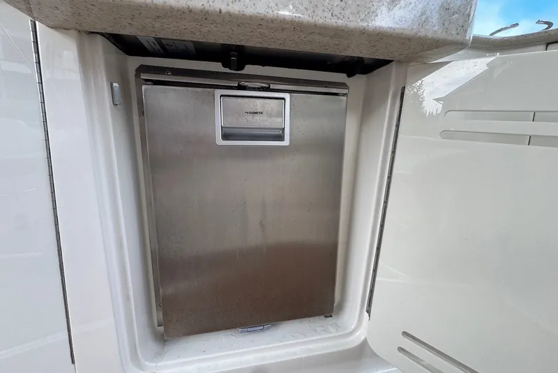 Slide: The Image of Built-in refrigerator on a 2008 Sea Ray Sundancer 310 yacht. - 12