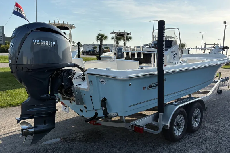 Slide: The Image of 2026 Bulls Bay 2200 XS boat with Yamaha engine on a trailer. - 2