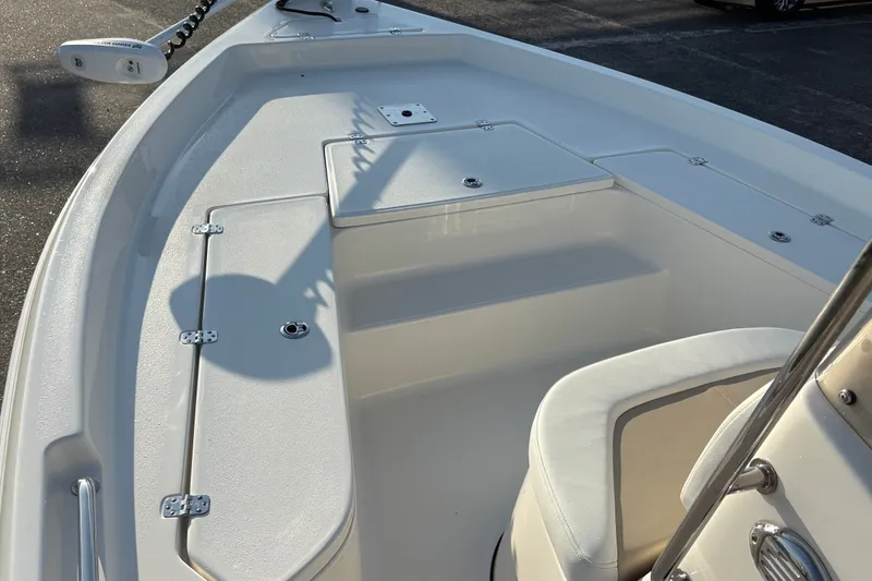 Slide: The Image of 2026 Bulls Bay 2200 XS boat interior with seating and storage compartments. - 17