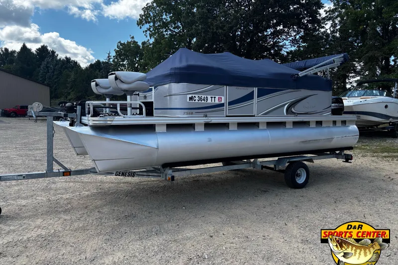 Slide: The Image of 2015 Qwest Adventure 7518 Sport Cruise pontoon boat on trailer, covered and parked outdoors. - 5
