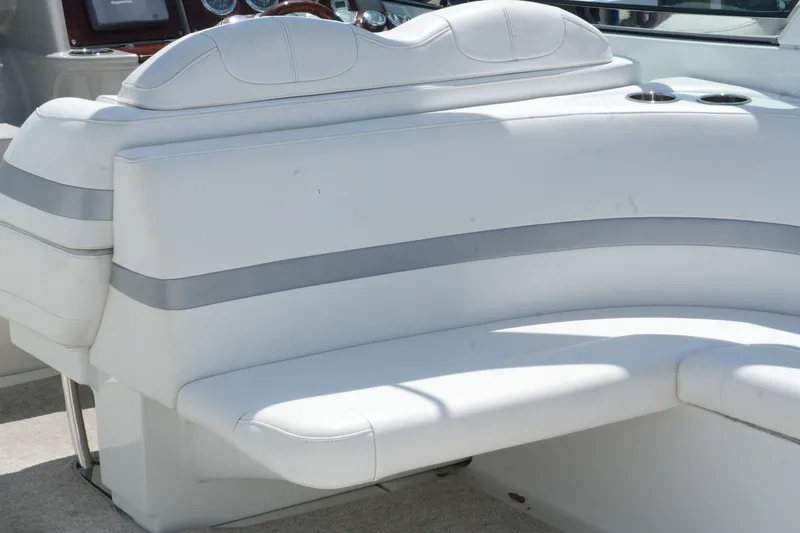 Slide: The Image of White leather seating on a 2004 Formula 330 Sun Sport boat. - 17