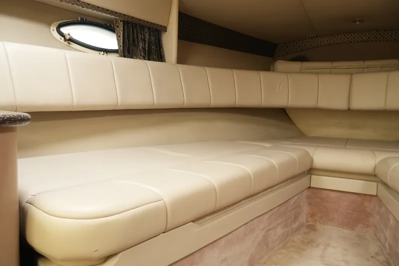 Slide: The Image of Interior cabin of 2004 Formula 330 Sun Sport boat with beige leather seating. - 35