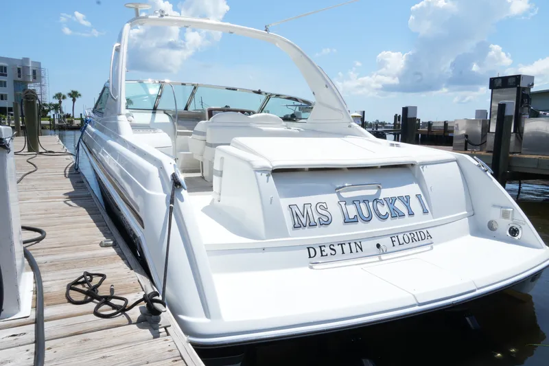 Slide: The Image of 2004 Formula 330 Sun Sport boat docked, named "MS Lucky I," in Destin, Florida. - 12