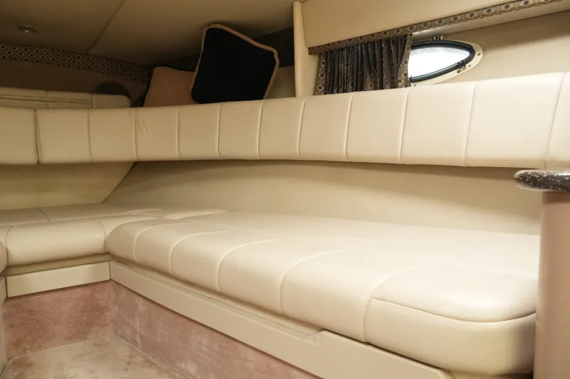 Slide: The Image of Interior cabin of a 2004 Formula 330 Sun Sport boat with beige seating. - 36
