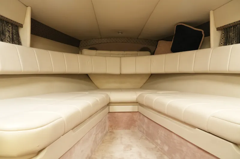 Slide: The Image of Interior cabin of a 2004 Formula 330 Sun Sport boat with beige seating. - 37