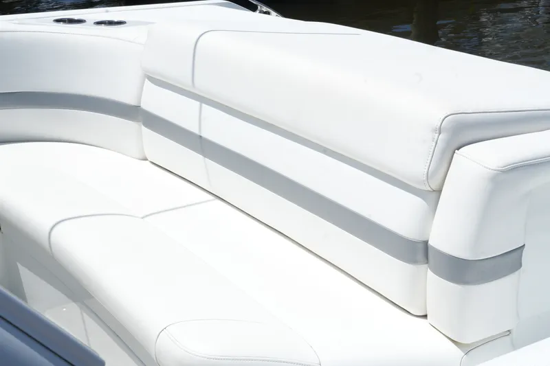 Slide: The Image of White leather seating on a 2004 Formula 330 Sun Sport boat. - 19