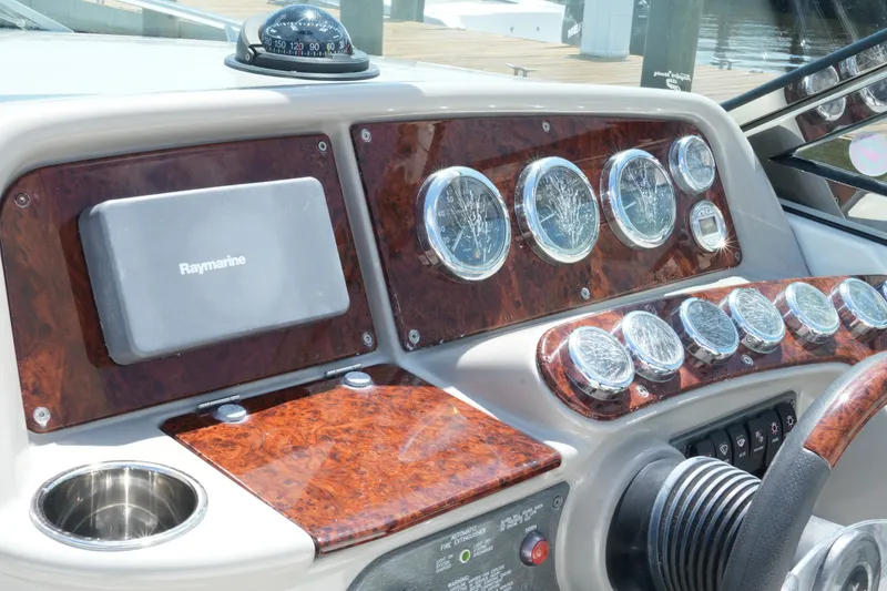 Slide: The Image of Dashboard of a 2004 Formula 330 Sun Sport boat with Raymarine equipment. - 25