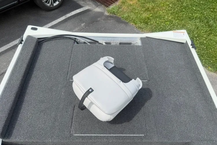 Slide: The Image of 2026 Crestliner 1600 Storm boat deck with a gray seat cushion. - 14