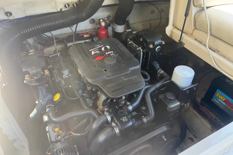 Slide: The Image of Engine compartment of a 2006 Sea Ray 240 Sundeck with MerCruiser 5.0 MPI engine. - 36