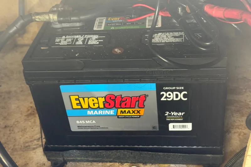 Slide: The Image of EverStart Marine Maxx battery in a 2006 Sea Ray 240 Sundeck boat. - 34