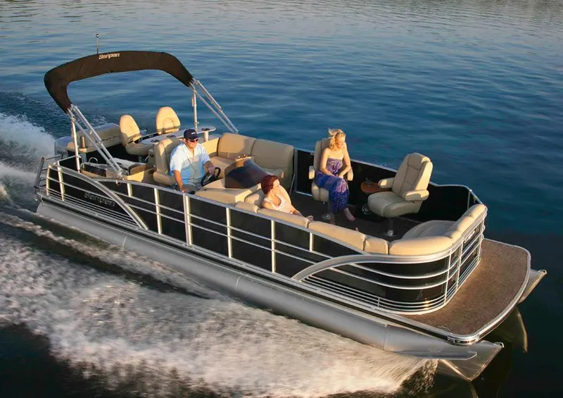 Slide: The Image of Manufacturer Provided Image: 2013 Sanpan 2500 FE pontoon boat cruising on a lake with passengers. - 13