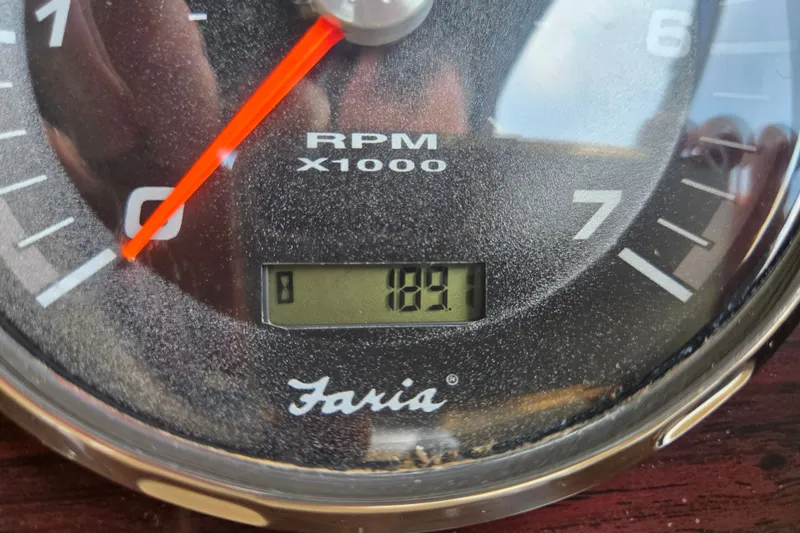 Slide: The Image of Close-up of a Faria tachometer showing 181 RPM on a Sanpan 2500 FE, 2013 model. - 53